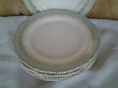 Eight stunning vintage pastel green woods wear dinner plates