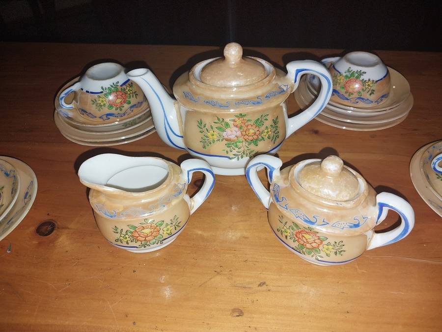 Collectable part procelain doll set