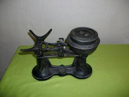 Metal scale with two weights,