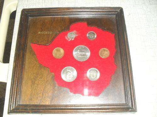 A SET OF 1970s  RHODESIAN COINS IN A FRAME