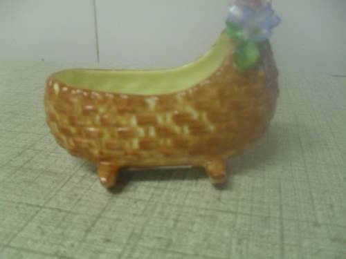 *# A VINTAGE BONE CHINA MINIATURE COALPORT CRADLE NO. AD1750