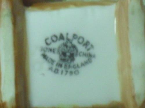 *# A VINTAGE BONE CHINA MINIATURE COALPORT CRADLE NO. AD1750