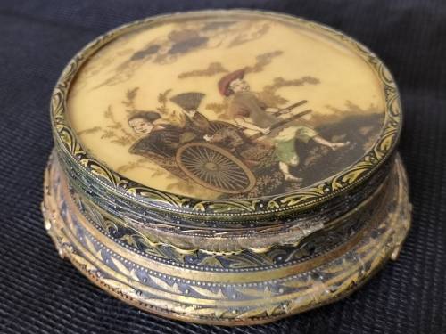 * FOOTED ANTIQUE METAL ORIENTAL JEWELLERY CASKET.