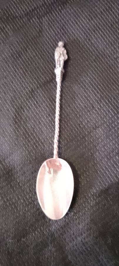A SILVER ANTIQUE APOSTLE TEA SPOONS - 10.5cm long weight 9cm.  LION AND CROWN.