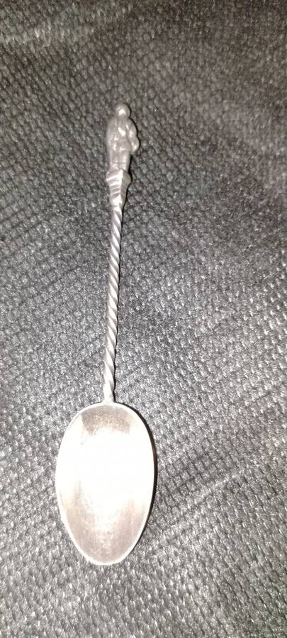 A SILVER ANTIQUE APOSTLE TEA SPOONS - 10.5cm long weight 9cm.  LION AND CROWN.