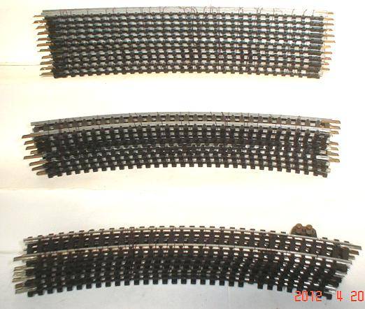 HO LIMA TRACK: 25pc mixed curved metal track fair condition.Not boxed(Made in Italy)