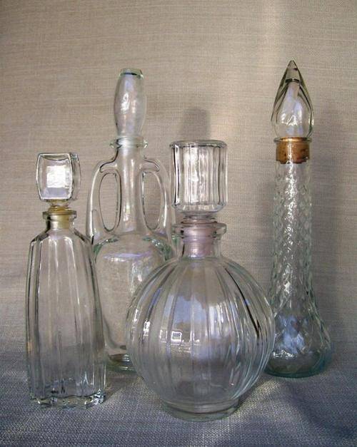 4 VINTAGE PRESSED GLASS DECANTERS