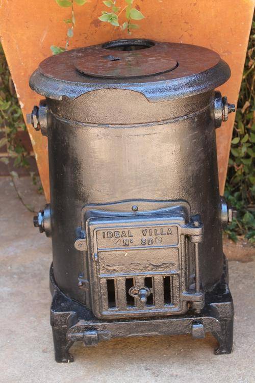 COAL STOVE/WATER WARMER (CAST IRON)