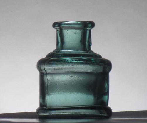 ANTIQUE COTTON WHEEL INK BOTTLE