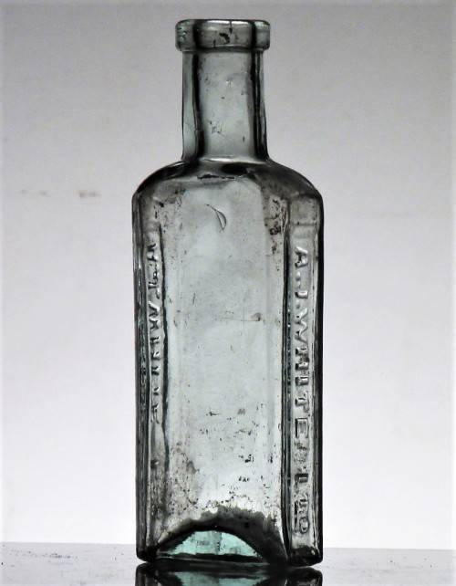 ANTIQUE AJ WHITE BOTTLE