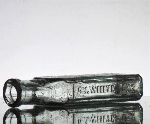 ANTIQUE AJ WHITE BOTTLE