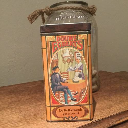 Vintage Douwe Egberts coffee tin depicting lady serving coffee made in holland