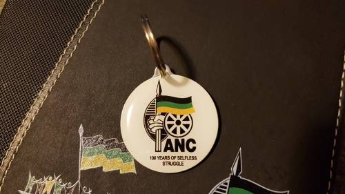 Nelson Mandela Collectors Clad gold medallion, commemorative Diary and Keychain.