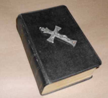 Crucifix and old Bible (includes the Apocrypha)