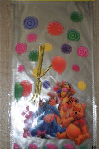 Winnie the pooh party loot bags/ sweet bags