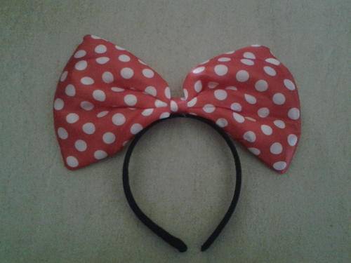 Minnie mouse aliceband with large bow, perfect for a party or concert