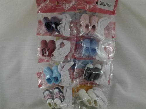 Barbie takkies and socks. you will get 1 pair, We send them randomly