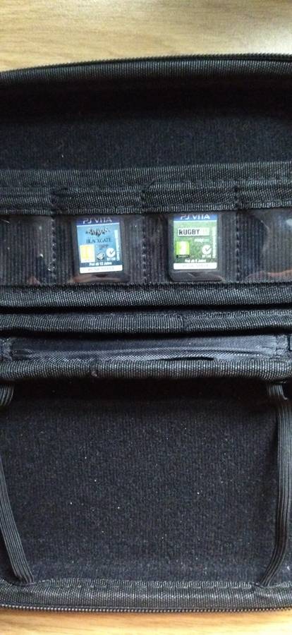 Sony Playstation Vita, Vita Case, 4GB Memory Card, 2 Games, SD2Vita (64GB) and Charger
