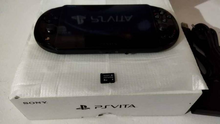 Sony Playstation Vita Slim Edition(IMMACULATE CONDITION) + 12 Games + 8GB Card + SD2Vita + Extras