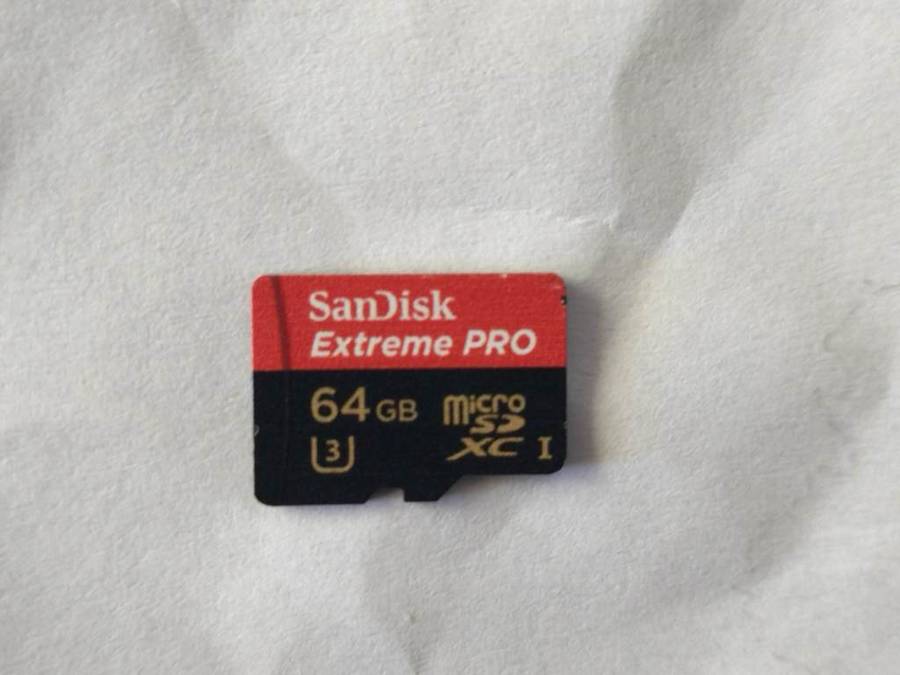 Nintendo Switch Lite (Turquoise) + Sandisk Extreme Pro 64 GB Memory Card with games + Carrying Pouch