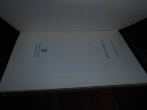 KAREL SCHOEMAN -  'N ANDER LAND  - 1984 1STE ED. HUMAN & ROSSOUW HARDEBAND