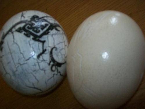 SET OF TWO OSTRICH EGGS -  MOTIVES DRAGON AND CAVE ART DECORATION ETC.