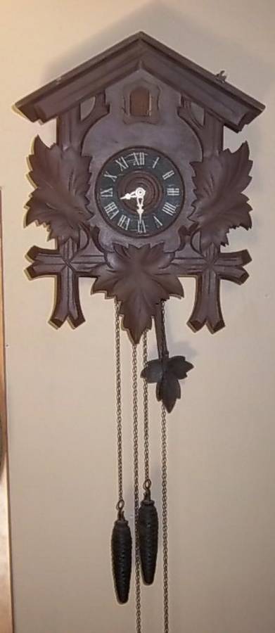 A BIG CUCKOO CLOCK IN WORKING ORDER