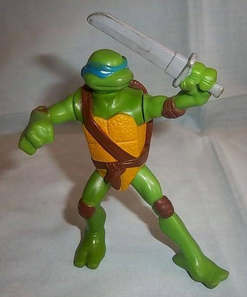A SMALL LEONARDO FIGURE, MADE FOR MCDONALDS