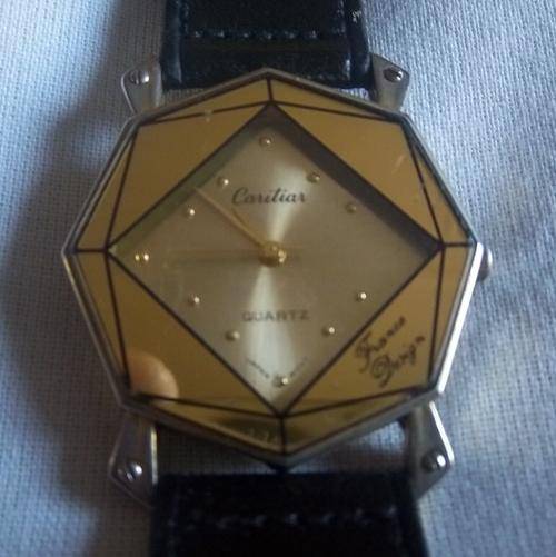 A MEN'S QUARTZ CARITIAR WRIST WATCH
