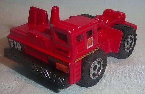 A RED 1989 MATCHBOX DUMP TRUCK