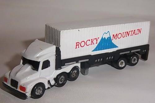 A MICRO MACHINES TRUCK WITH ROCKY MOUNTAIN TRAILER