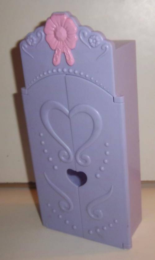 A PURPLE WARDROBE FOR DOLLS BY MATTEL