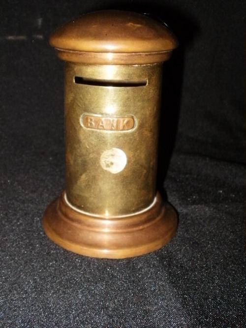A VERY CUTE BRASS AND COPPER MONEY BOX