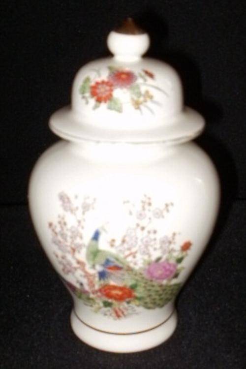 A SMALL JAPANESE URN WITH PEACOCK MOTIVE