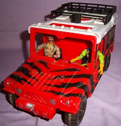 A DINO VALLEY CAR WITH X2 FIGURES