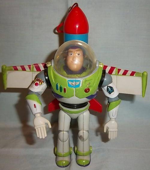 A VINTAGE BUZZ LIGHTYEAR WITH THE BIG ONE ROCKET ON HIS BACK BY THINKWAY