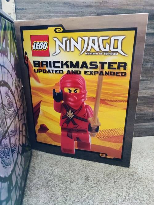 2014 Lego Ninjago Brick Master Updated and expanded Storage Box and Hard Cover Book