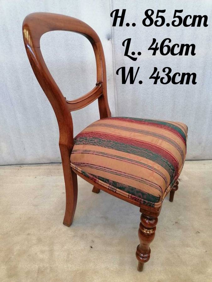 A set of 6 Mahogany Balloon back chairs