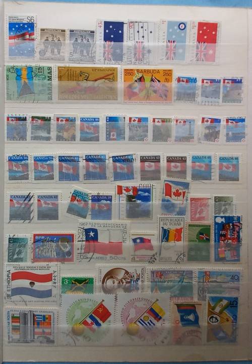 THEMATICS - Flags on Stamps - 90 Stamps