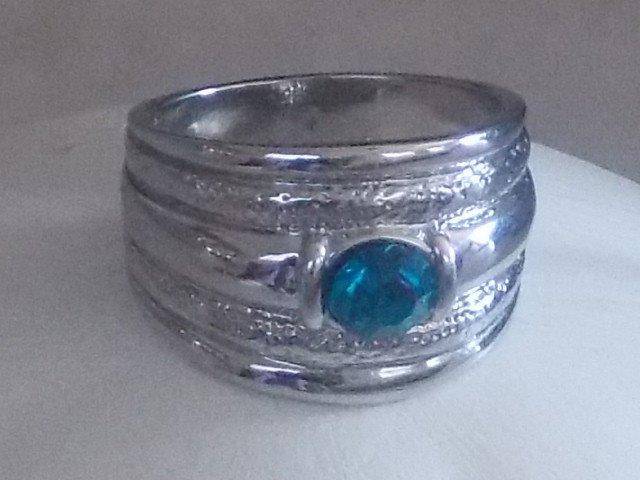 NEW ON BOB!!!!STUNNING SILVER EP RING WITH HUGE SIMULATED BLUE TOPAZ 19,(FREE IMPORT SHIPPING)