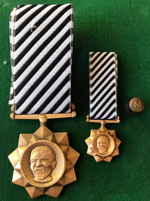 FULL SIZE & MINIATURE MANDELA MEDAL WITH STICK PIN- THE FULL SIZE NUMBERED
