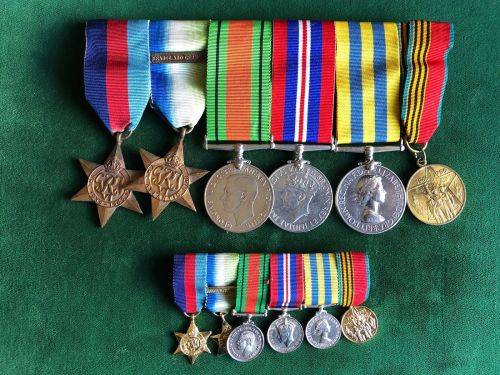 FULL SIZE WITH MINIATURES WW2 WITH KOREA MEDAL GROUP(1951) THE KOREA MEDAL NAMED TO BUCK S.P. PMX 80