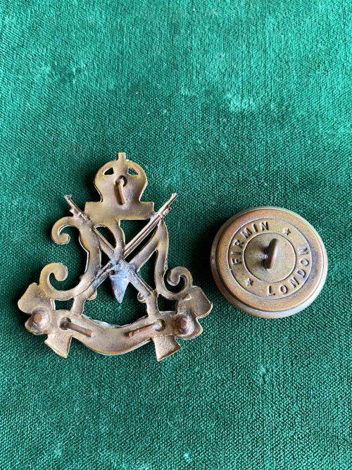 ROYAL NATAL CARBINEERS CAP BADGE,WHITE METAL-WORN 1936-1940-SOLD WITH ONE BUTTON-DIAMETER 150MM-CAP