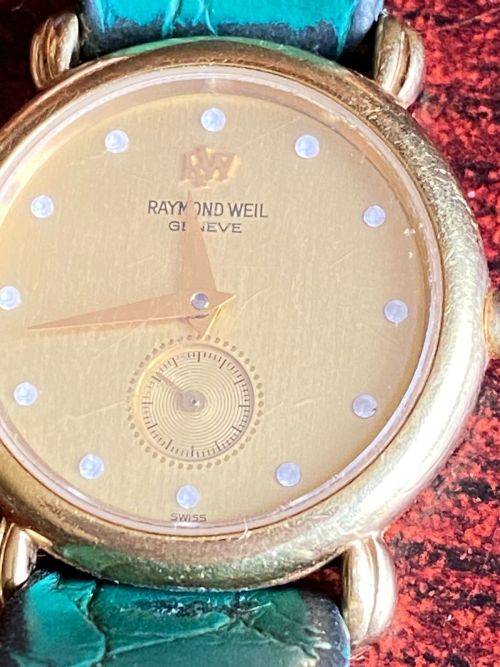 RAYMOND WEIL LADIES WATCH-18 CT GOLD-ELECTROPLATED-DIAMETER ON THIS WATCH IS 14 MM