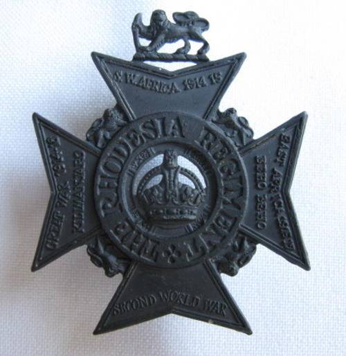 RHODESIA REGIMENT BLACK CAP BADGE-WORN 1972-1980-LUGS INTACT