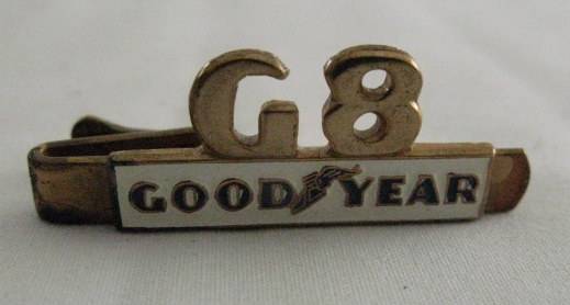 VINTAGE BRASS AND ENAMEL GOOD YEAR TIE PIN