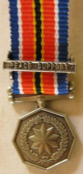 NO. 3715)  MINIATURE S.A.N.D.F. PEACE SUPPORT OPERATIONS.  MEDAL WITH BAR.