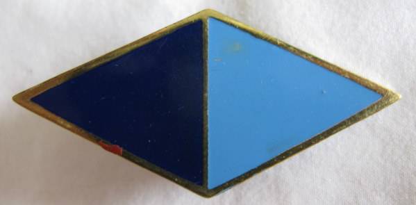 RHODESIAN CORPS OF SIGNALS ENAMEL ON BRASS SLOUCH HAT BADGE WORN ON UPTURNED SIDE OF HAT