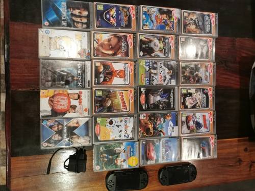 2 × Sony PSP consoles + Games and movies in good condition