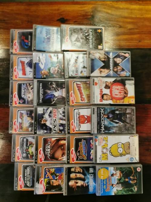 2 × Sony PSP consoles + Games and movies in good condition